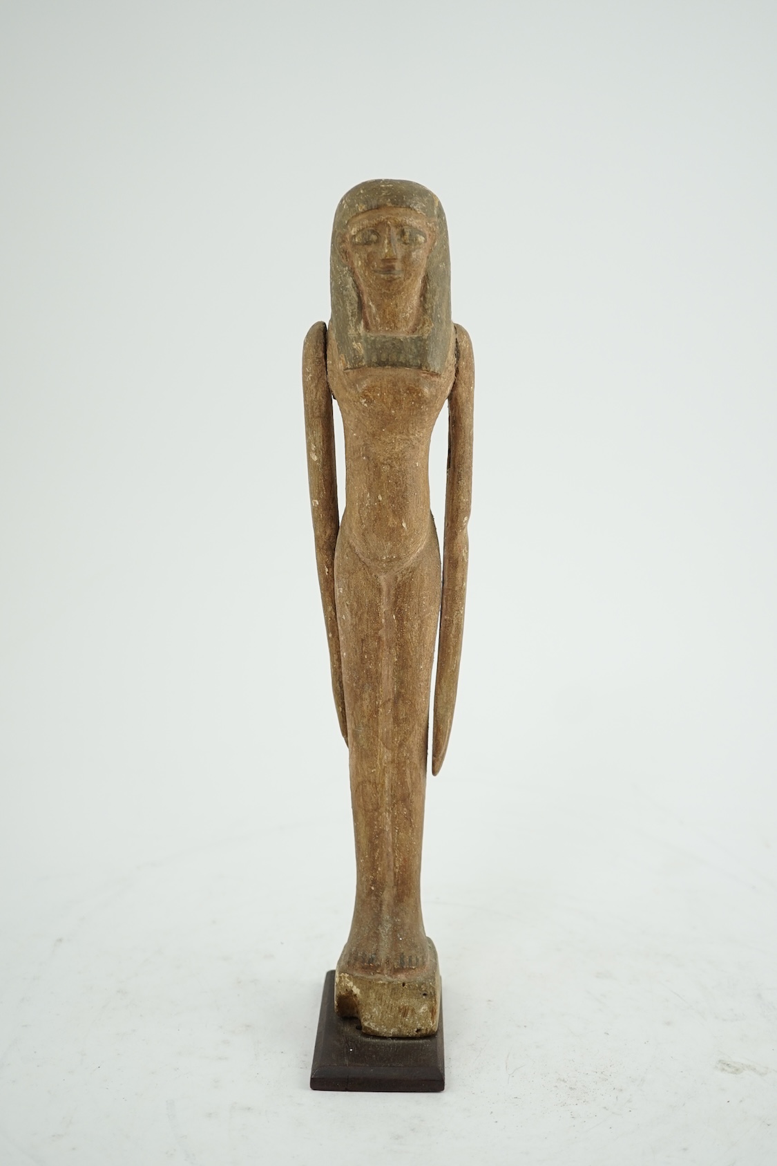 An Egyptian painted gesso and wood portrait statuette of a woman, probably Middle Kingdom, 12th dynasty, 1991-1802 BC